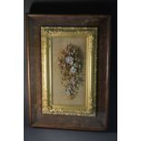 A 19th century seaweed and shell picture, arranged as a spray of flowers, gilt frame,