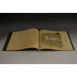 An early 20th century sketch book, with fourteen head and shoulder pencil sketches,