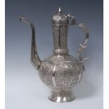 An Indian silvered metal rosewater ewer, in the typical Islamic taste,