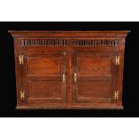 A George III oak wall-hanging food cupboard,