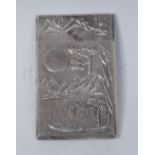 A Chinese silver rectangular visiting card case, embossed with a sampan in a monumental landscape,