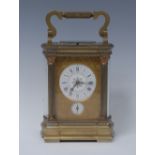 A French gilt brass quarter-repeating carriage clock, 5.