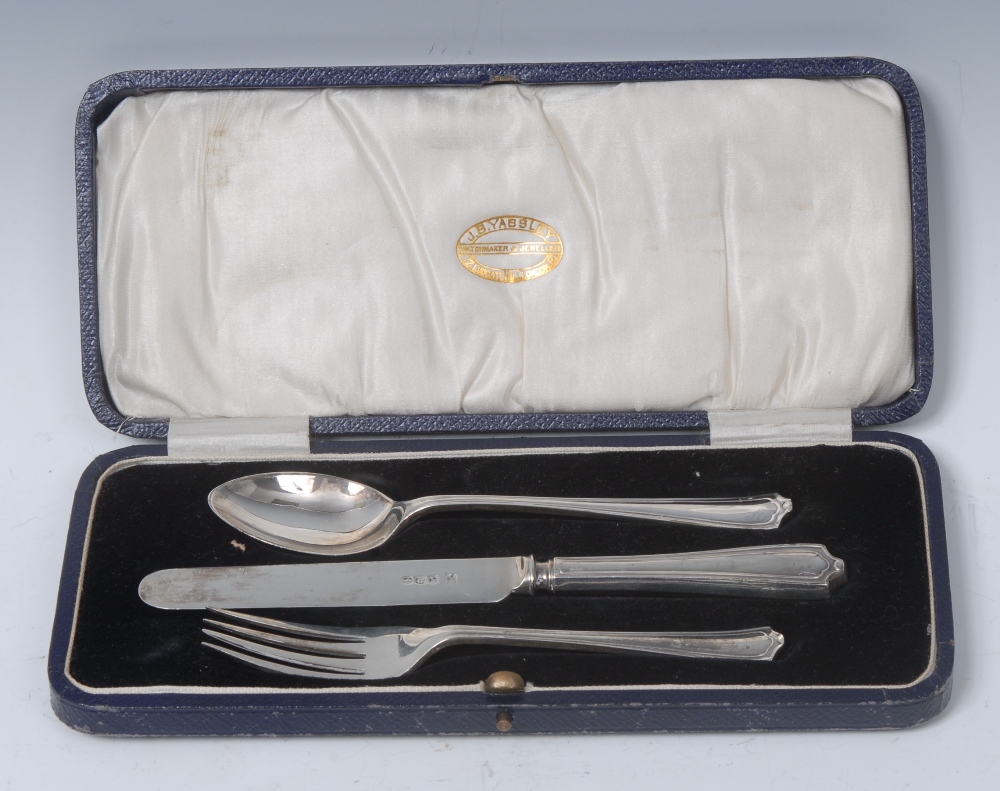 An Art Deco silver three piece christening set, comprising knife, fork and spoon, Sheffield 1927,