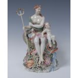 A large Derby Patch Mark figural group, Venus and Cupid, she seated on he back of a dolphin,