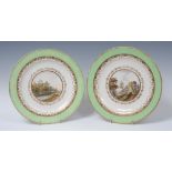 A pair of Derby Named View circular plates, painted by George Robertson, At Daltons,