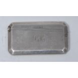 A George V silver canted rectangular visiting card case, hinged cover, 9cm wide,