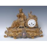 A 19th century French porcelain mounted gilt metal mantel clock, 7.