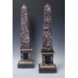 A pair of substantial amethyst quartz library obelisks,