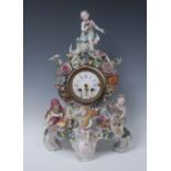 A 19th century Continental porcelain clock, Allegorical of the Seasons, with white enamel dial,