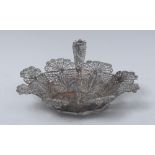 A Continental silver filigree shaped circular dish, possibly Maltese, swing handle, 13.5cm wide, c.