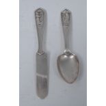 Tiffany & Co - an American silver christening set, comprising a child's knife and spoon,