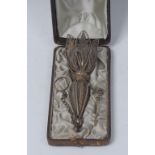 A 19th century silver filigree posy holder, typically worked with stylised flowers,