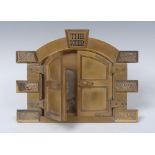 A Victorian gilt brass novelty photograph frame, The Keep, in the form of a castle gateway,