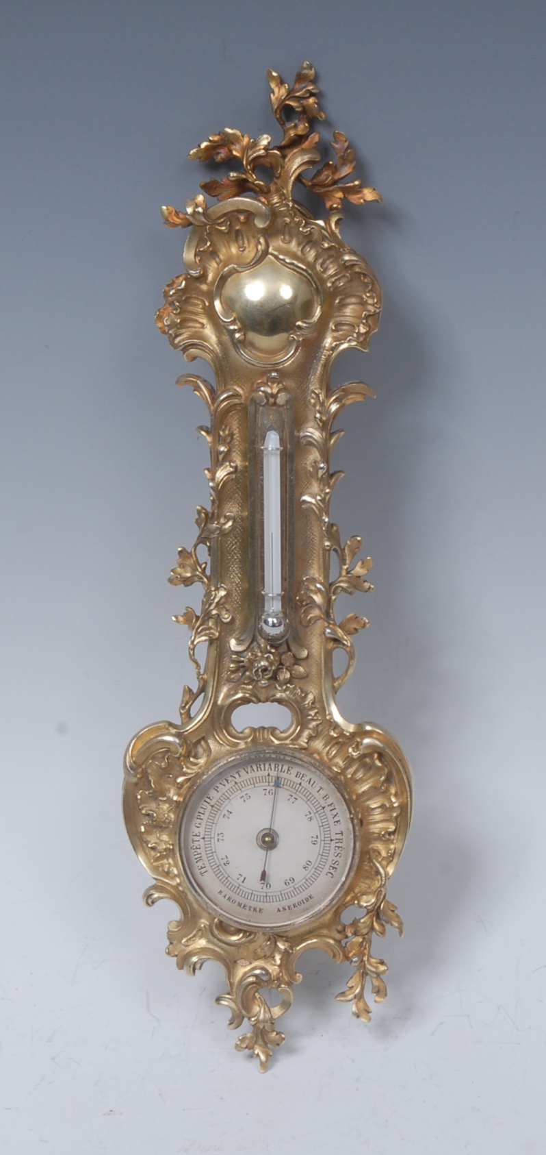 A 19th century French cast silver-gilt aneroid barometer, in Louis XV style, 4.