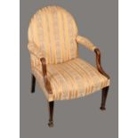 A George III mahogany open armchair, arched back, stuffed-over upholstery, reeded downswept arms,