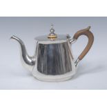 A 19th century Russian silver bachelor's teapot, quite plain, knop finial,