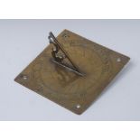 A George III brass square sundial, engraved scale, pierced gnomon, 12.5cm wide, c.