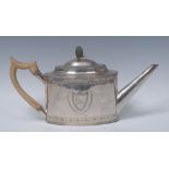 A George III silver drum shaped teapot, stained ivory pinecone finial, flush-hinged domed cover,