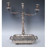 A large Sheffield plated three-light, two branch candelabrum, with detachable floral nozzles,