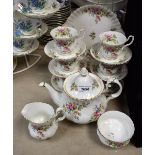 A Royal Albert Moss Rose pattern tea set, comprising six tea cups, six saucers, six tea plates,