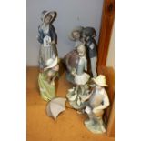 Lladro figures - a collection of five Lladro figures to include lady with parasol;