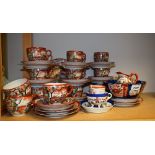 Ceramics - an extensive Japanese eggshell tea service, Oriental scenes on white ground,
