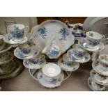 A Royal Albert Forget-Me-Not pattern tea set, comprising six tea cups, six saucers, six tea plates,