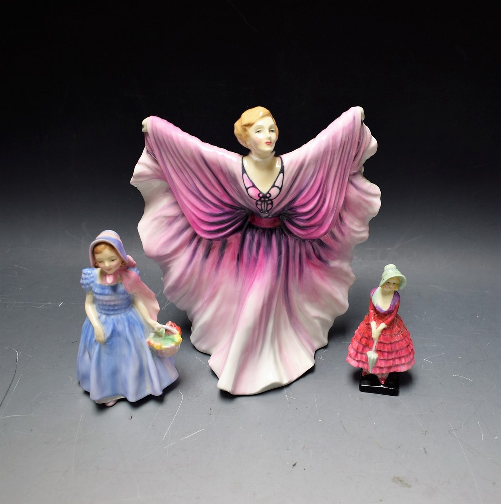 A Royal Doulton figure, Isadora, HN2938, second quality; another, Wendy, HN2109; another,
