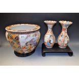 A pair of Japanese baluster vases, painted with figures and garden landscapes, 22cm,