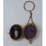 A 19th century French gilt metal and mother of pearl egg shaped scent bottle case,