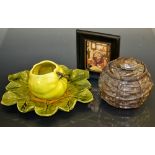 An unususal Bretby tobacco jar and cover, as a fishing creel surmounted with a crab,