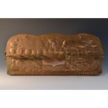 An Arts and Crafts copper pipe rack, embossed with phoenix, 43cm wide, c.