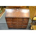 A George III mahogany bureau, fall front enclosing stepped drawers, ebony stringing throughout,