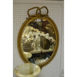 A 19th century giltwood and gesso looking glass,