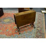 A Sheraton revival walnut Pembroke table