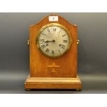 An early 20th century mantel clock, inlaid with an urn, twin winding holes eight day movement , c.