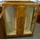 An Art Deco walnut display cabinet;