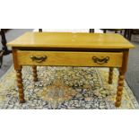 A late 20th century oak coffee table ,