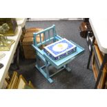 A child's high chair, painted blue; a 1950's childs tea service,