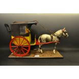 A scratch built model of a horse drawn Handsome cab