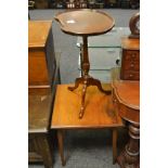 A contemporary mahogany dished top kindney shaped occasional table;