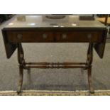 A mid 20th century mahogany sofa table, two short drawers to frieze , lyre supports,