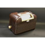 An Art Deco Bush vintage, brown bakelite radio,