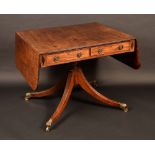 A Regency mahogany sofa table, rounded rectangular top, two short drawers to frieze,