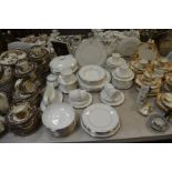 A Royal Doulton Carnation pattern dinner and coffee service, for six,