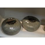 A pair of curling stones