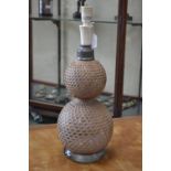 A 19th century double gourd wicker and glass soda siphon,