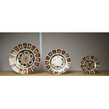 Royal Crown Derby - an 1128 Imari pattern 27cm diameter plate; others smaller 22cm and 16cm,