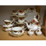 Royal Albert Old Country Roses - a tea service comprising six cups and saucers, teapot, sugar bowls,