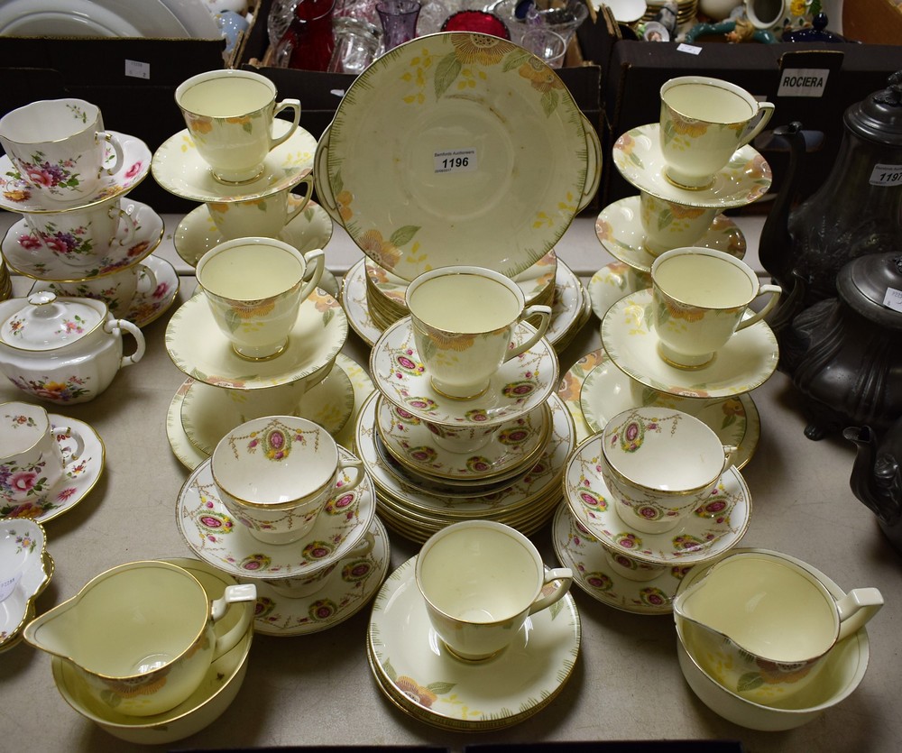 Ceramics - a Royal Doulton Nerissa pattern tea service to include twelve cups, thirteen saucers,